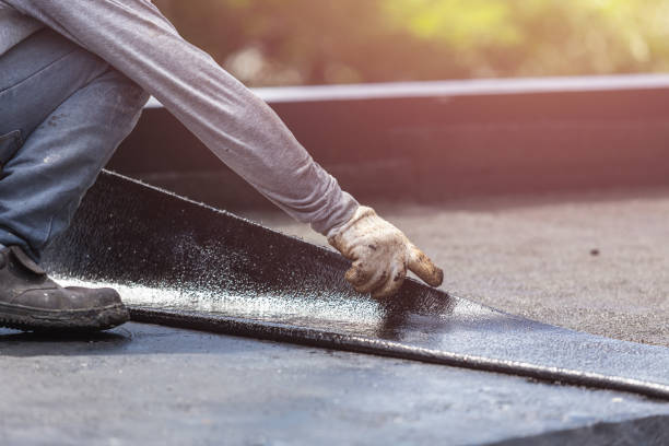 Professional Basement Waterproofing technician working in Elmhurst, IL